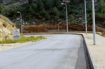 The following picture contains several road elements. How should a driver respond when approaching these elements? Picture for question 929